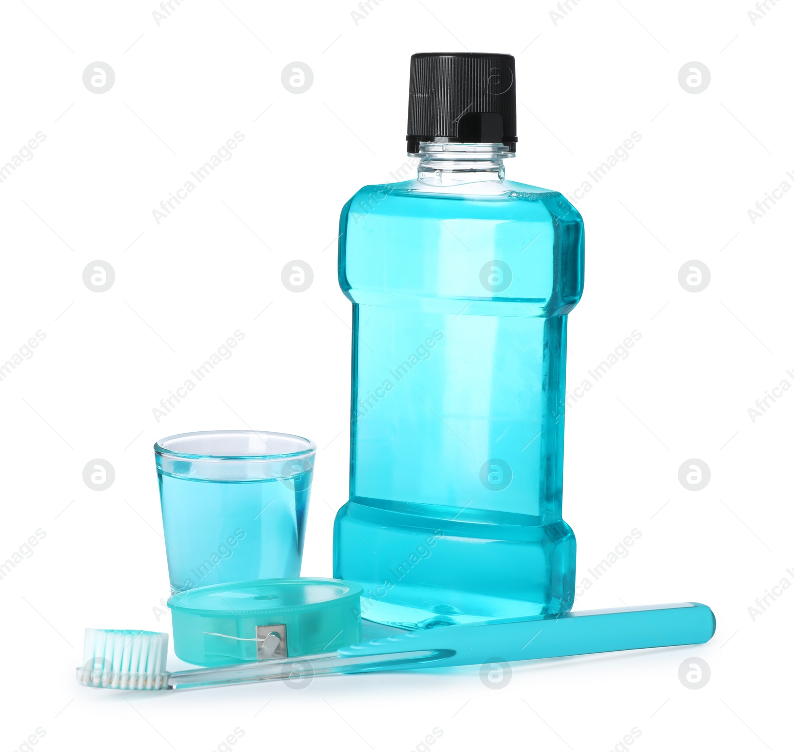 Photo of Mouthwash and other items for teeth care on white background