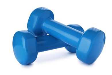 Photo of Color dumbbells on white background. Home fitness