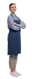 Beautiful young woman in clean denim apron on white background