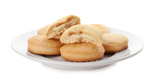 Photo of Plate with cookies for Islamic holidays isolated on white. Eid Mubarak