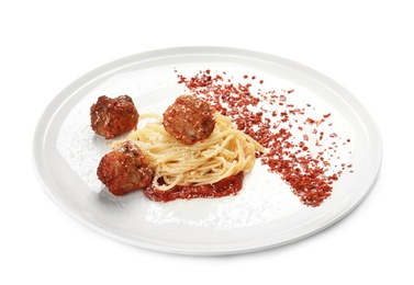 Delicious pasta with meatballs and tomato sauce on plate, isolated on white