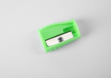 Photo of Modern green pencil sharpener on white background