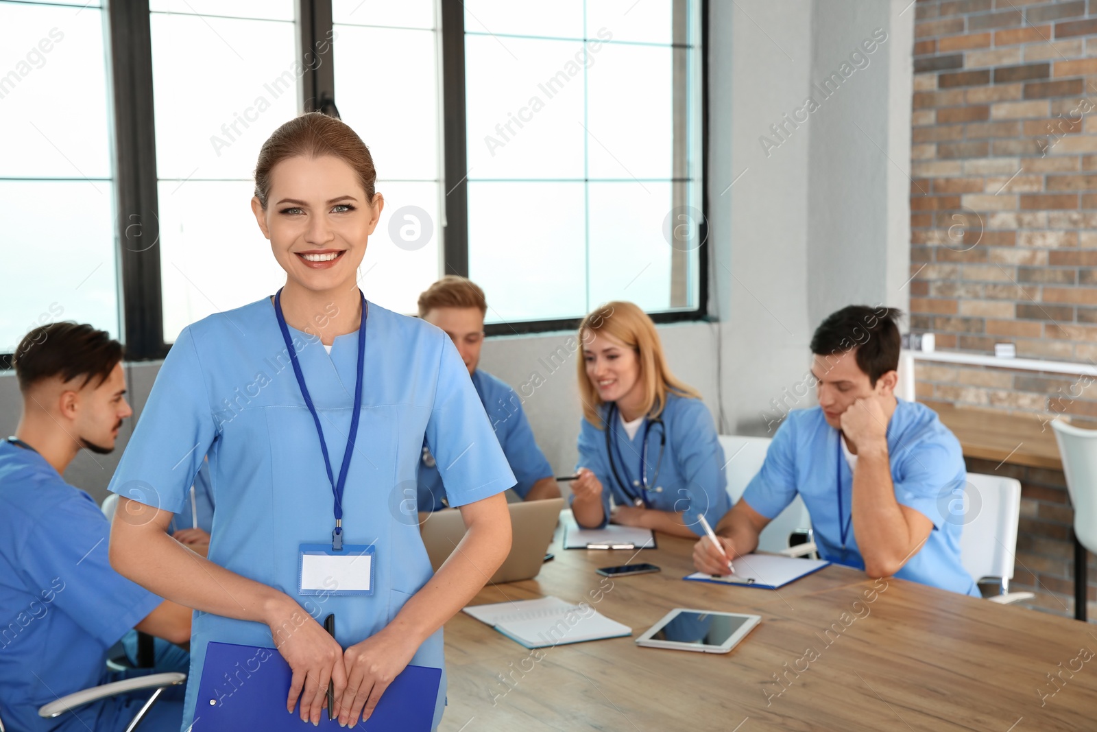 Photo of Medical student with groupmates in university library