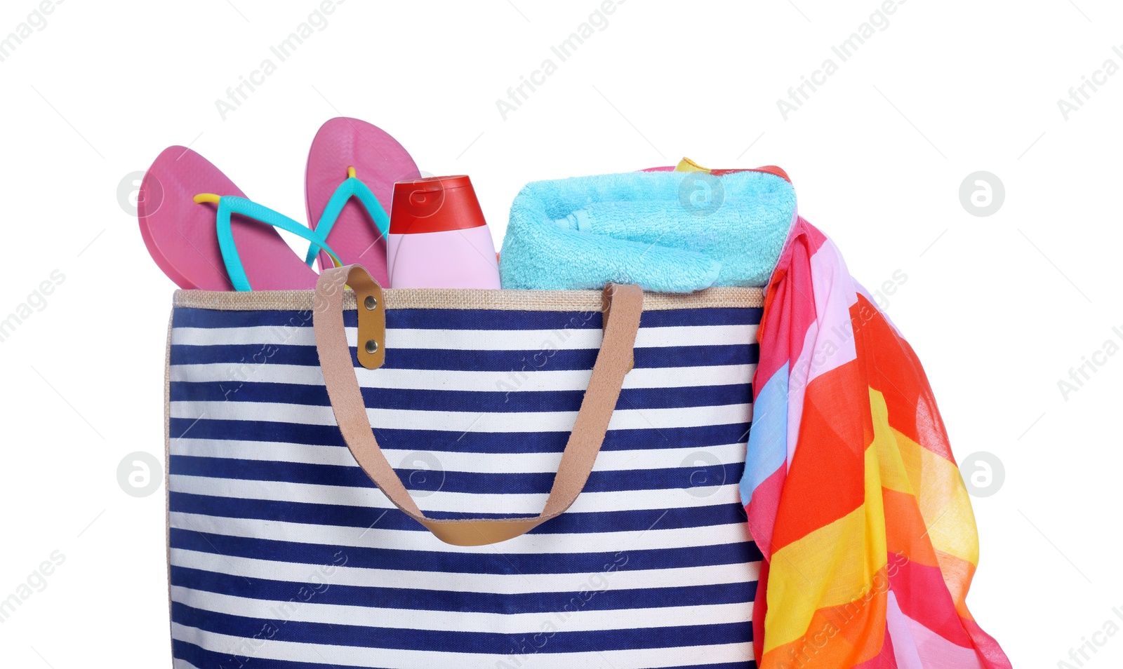 Photo of Stylish bag, sunscreen and other beach accessories isolated on white