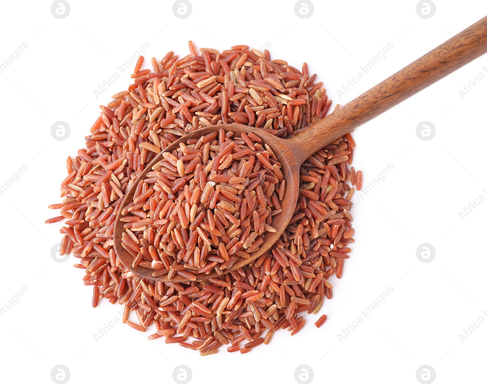 Photo of Brown rice and spoon isolated on white, top view