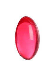 Photo of One bright pink pill isolated on white