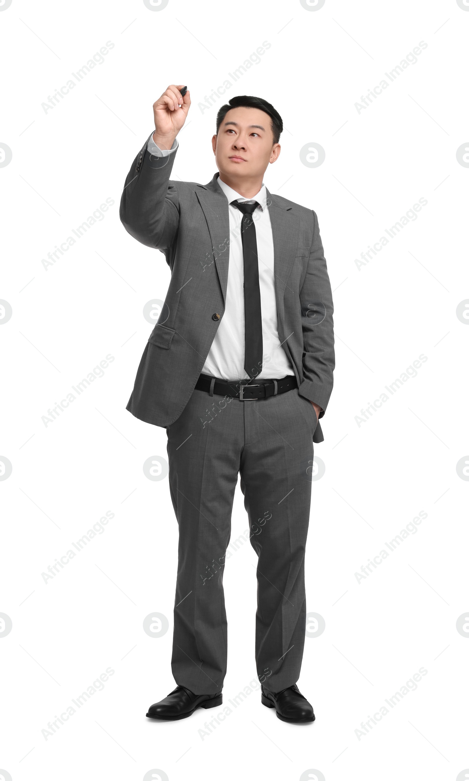 Photo of Businessman with marker writing on white background