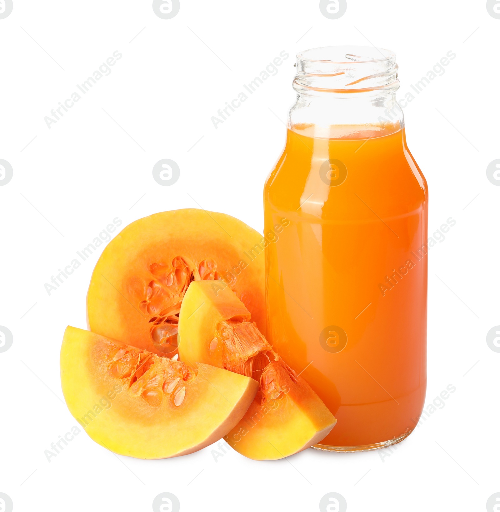 Photo of Glass bottle with pumpkin juice and fresh vegetable on white background