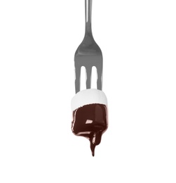 Photo of Tasty marshmallow dipped into chocolate fondue on white background