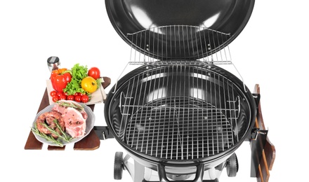 Photo of Modern barbecue grill with tasty food on white background