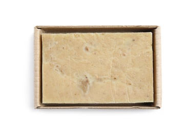 Hand made soap bar in cardboard package on white background, top view