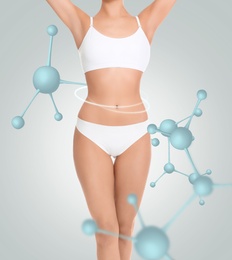 Image of Metabolism concept. Woman with slim body and molecular chains on light background
