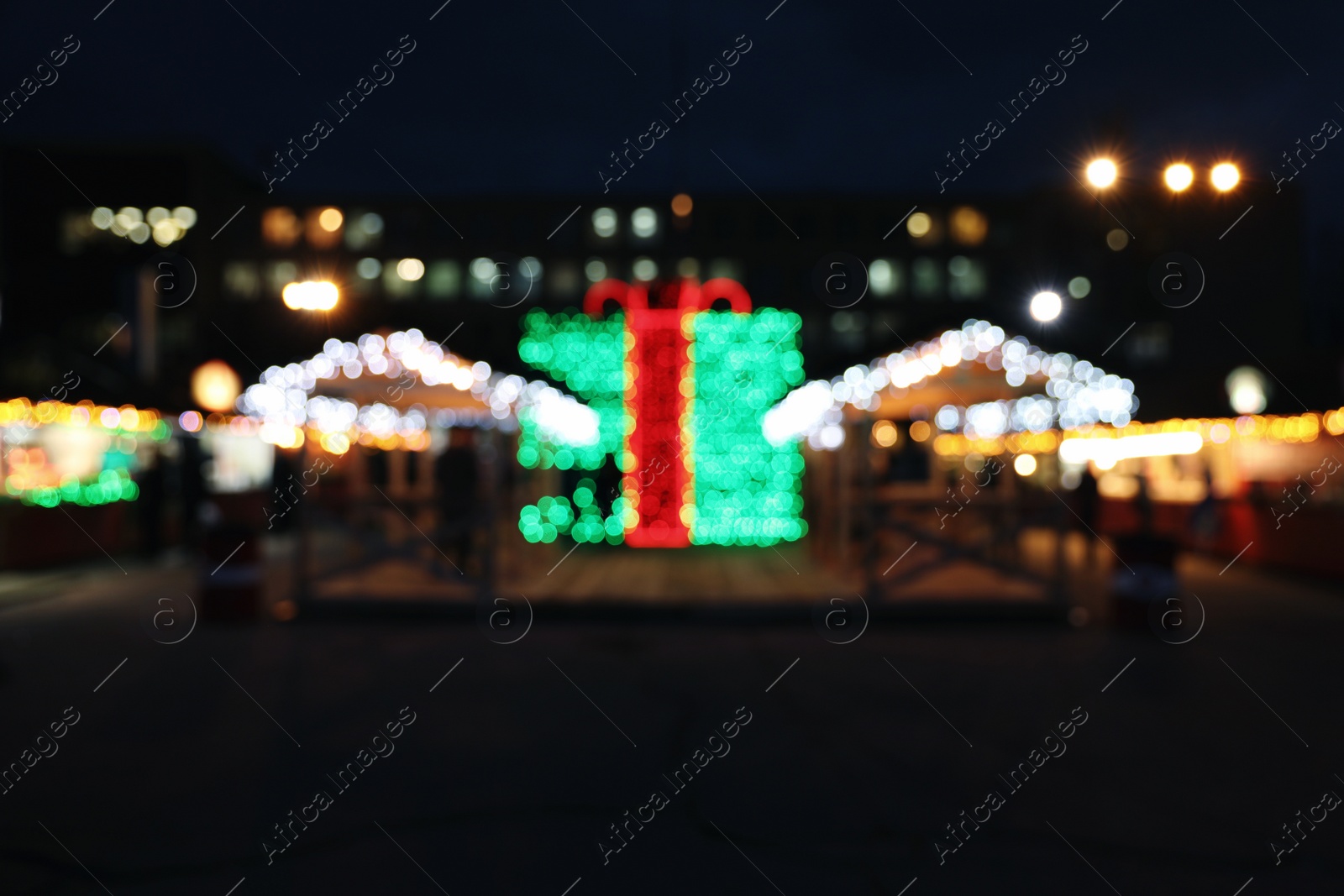 Photo of Beautiful bright Christmas decor outdoors. Bokeh effect