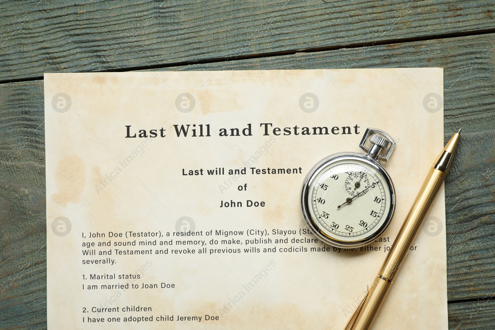 Photo of Last Will and Testament, pocket watch and pen on rustic wooden table, top view