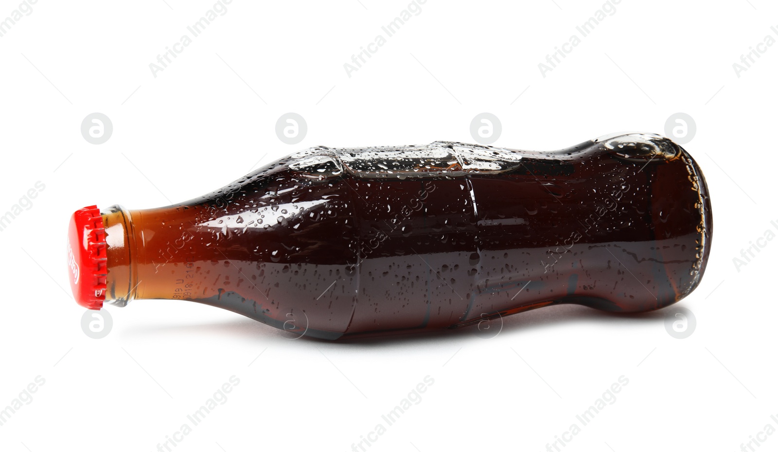 Photo of MYKOLAIV, UKRAINE - NOVEMBER 15, 2018: Glass bottle of Coca Cola on white background