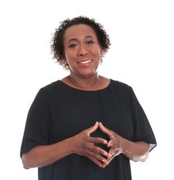 Portrait of happy African-American woman on white background