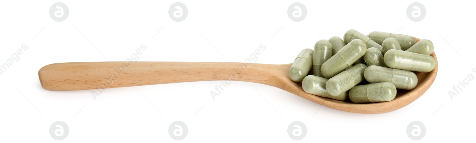 Photo of Vitamin capsules in wooden spoon isolated on white. Health supplement