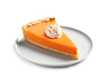 Plate with piece of fresh delicious homemade pumpkin pie on white background