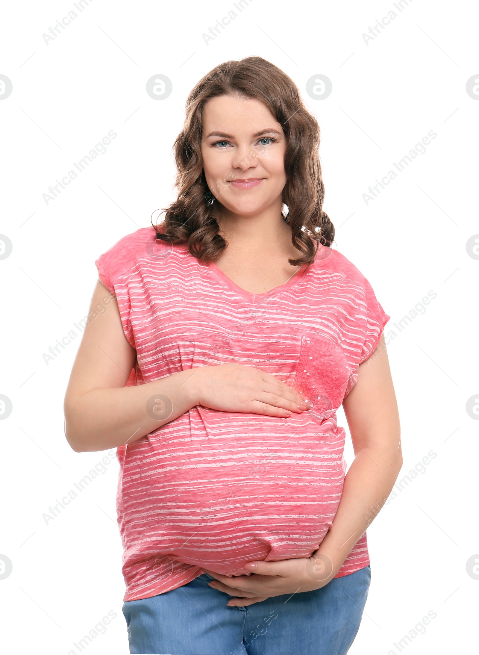 Photo of Young pregnant woman in casual clothes on white background