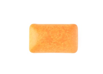 One tasty orange chewing gum isolated on white, top view