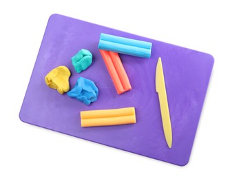 Photo of Board with plasticine and knife on white background, top view