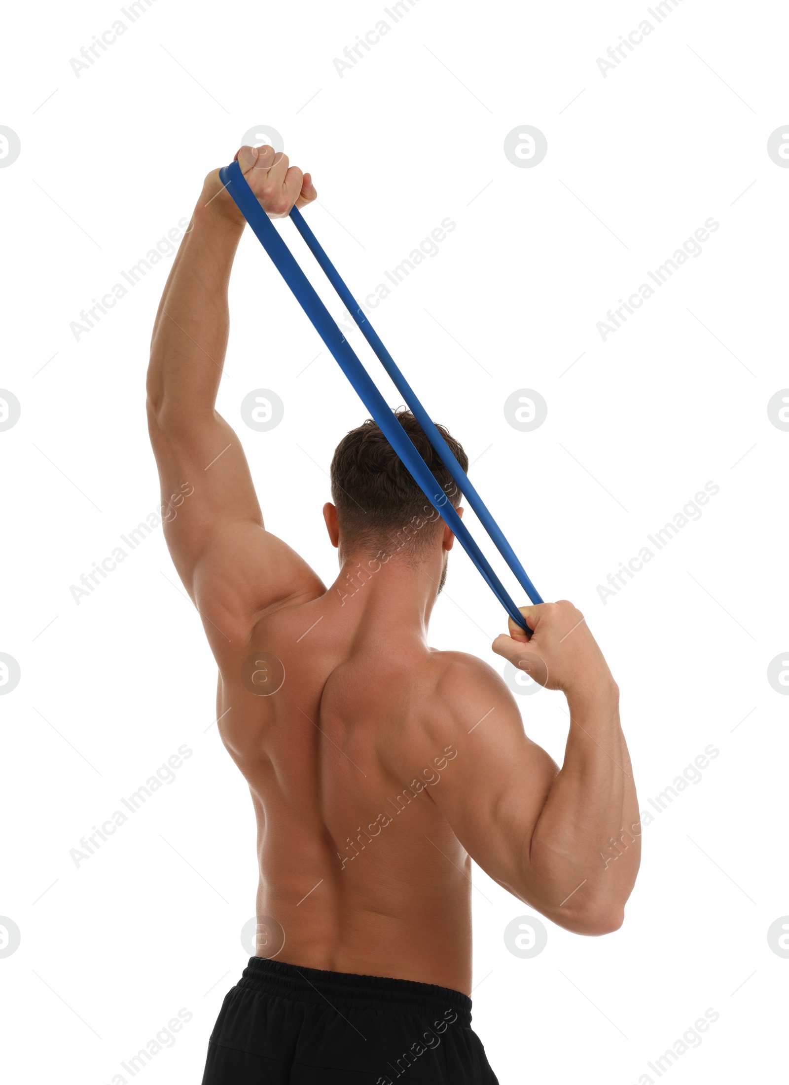 Photo of Young man exercising with elastic resistance band on white background, back view