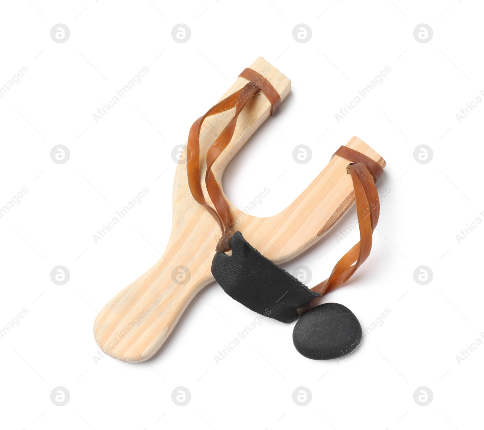 Photo of Wooden slingshot with pebble isolated on white, above view