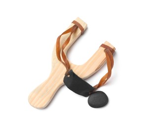 Photo of Wooden slingshot with pebble isolated on white, above view