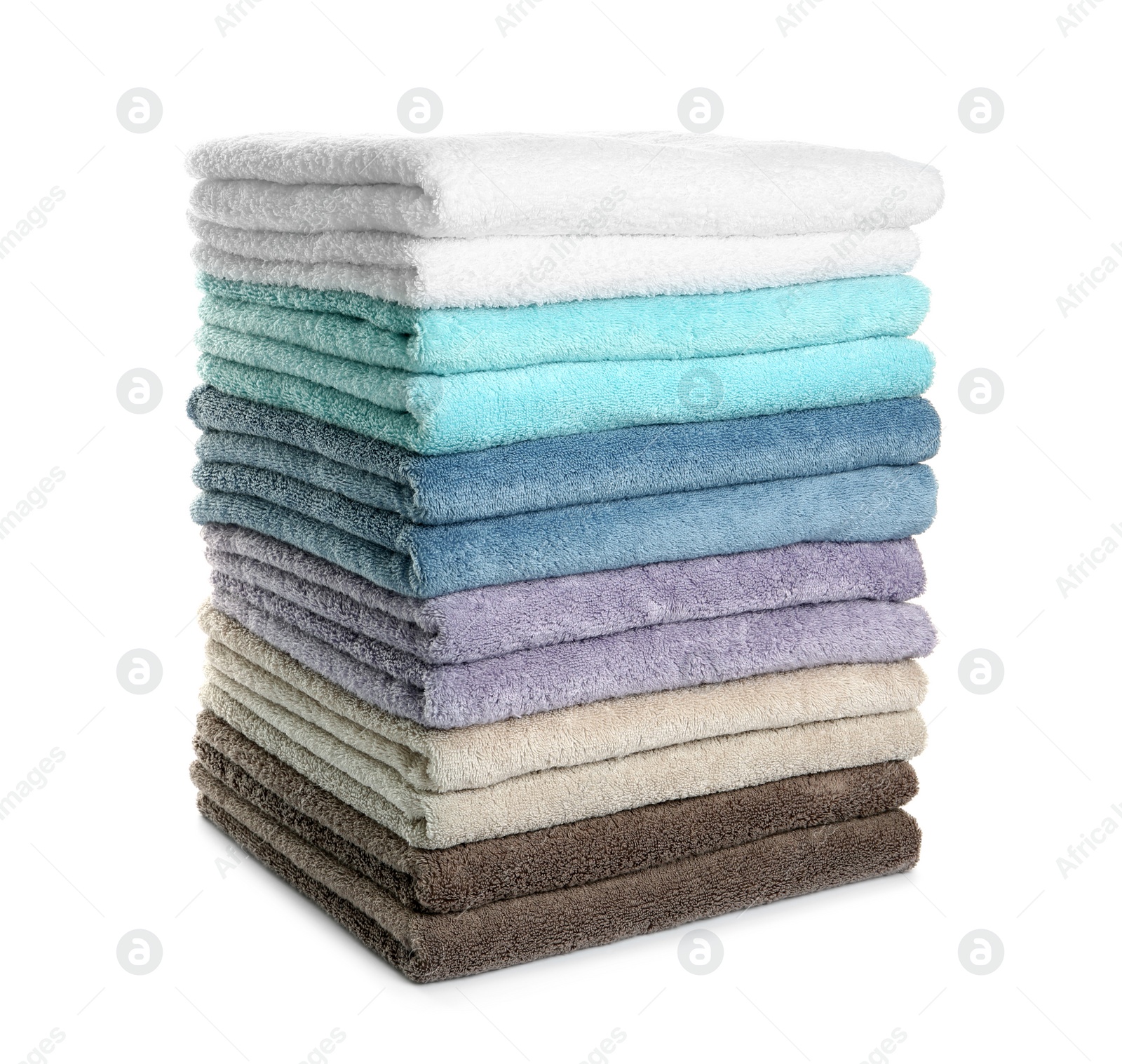 Photo of Different fresh soft terry towels on white background