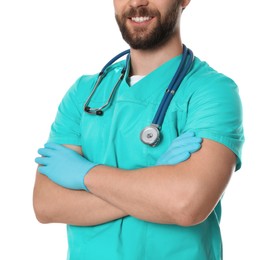 Photo of Doctor or medical assistant (male nurse) in uniform with stethoscope on white background, closeup