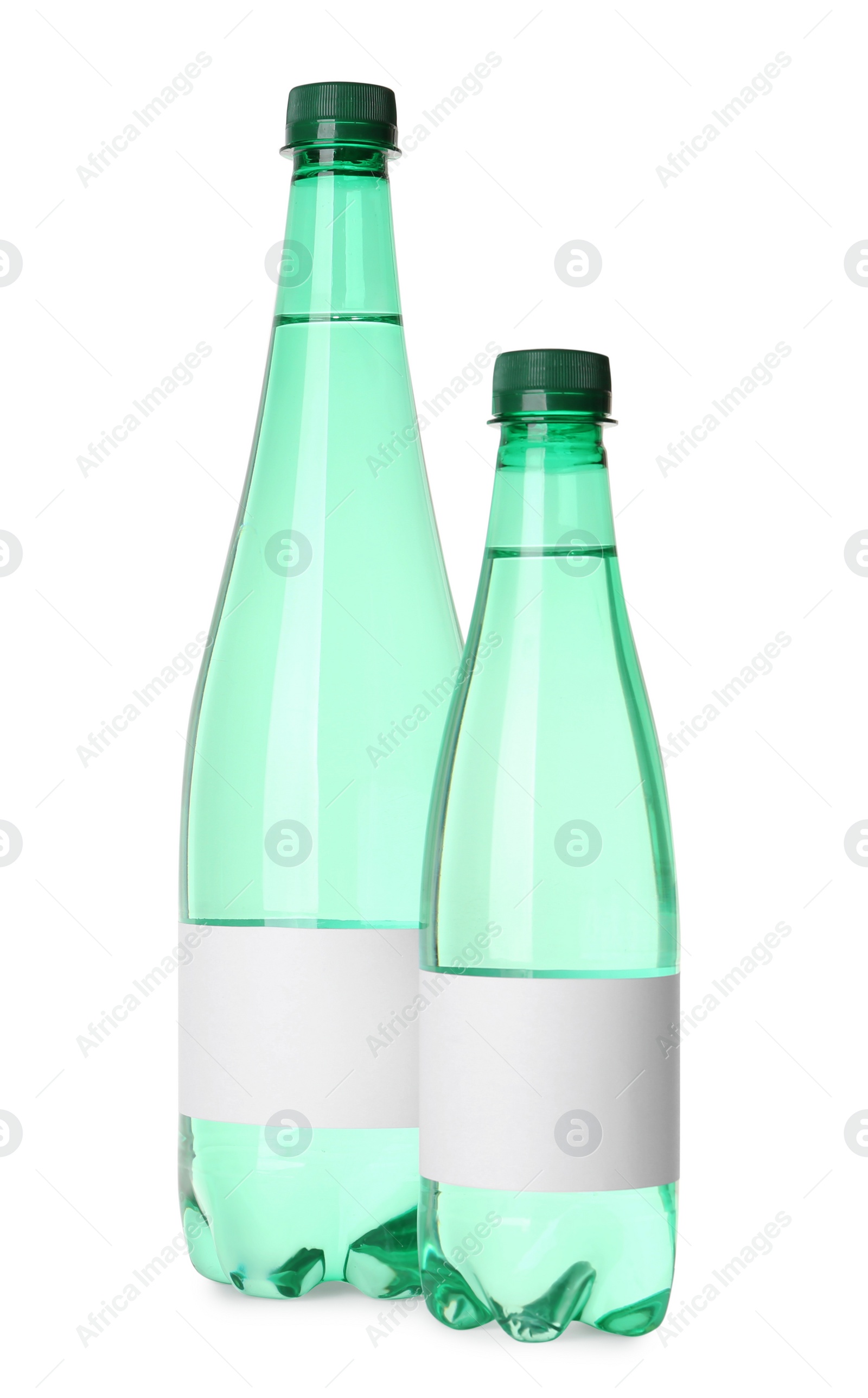 Image of Bottles of pure water with blank labels on white background