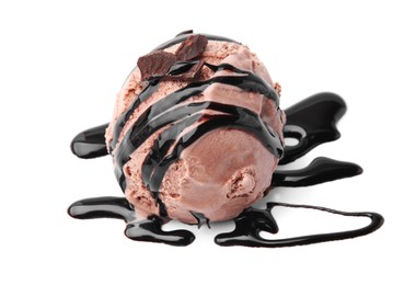 Scoop of tasty ice cream with chocolate chunks and syrup isolated on white