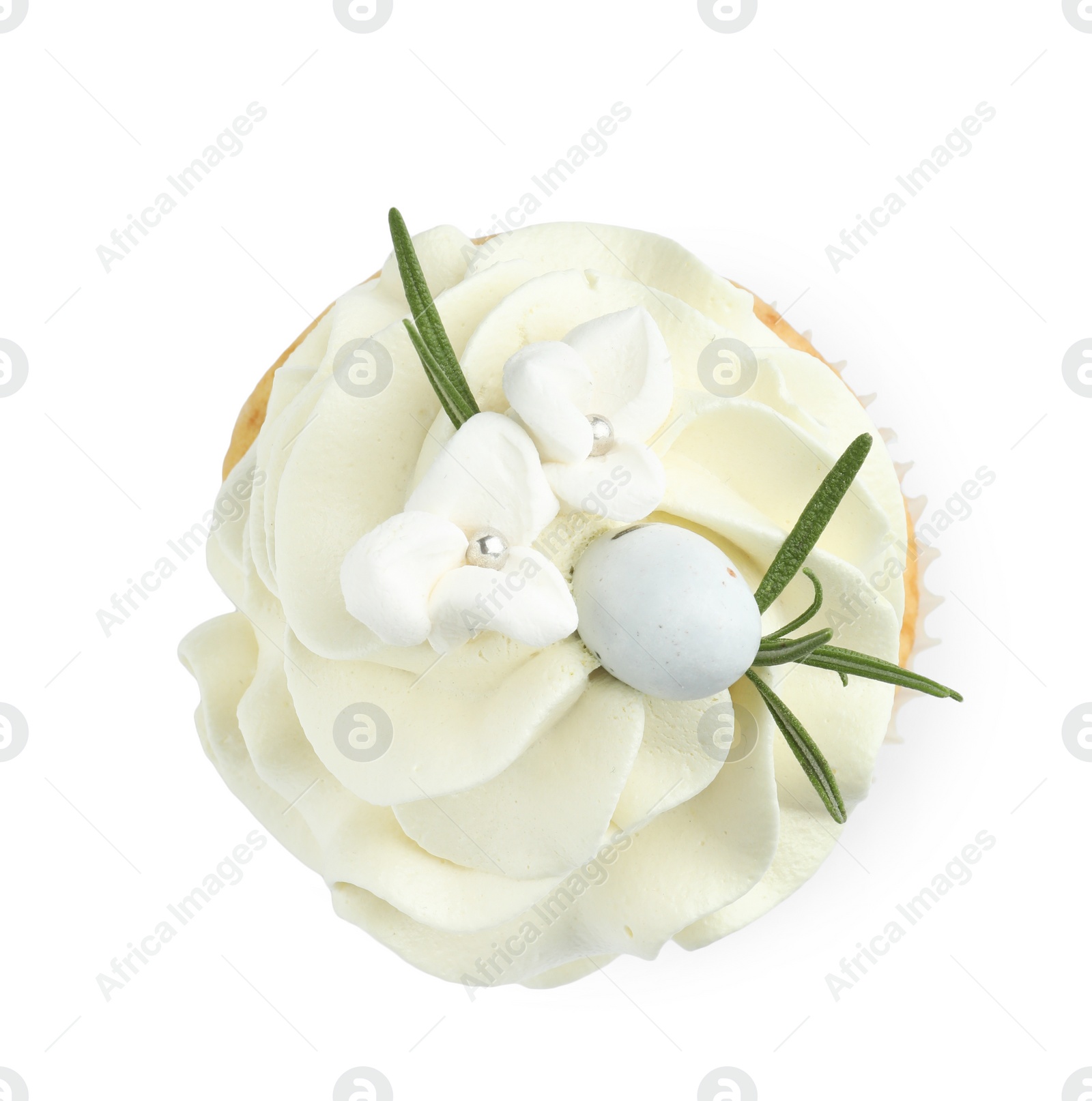 Photo of Tasty Easter cupcake with vanilla cream isolated on white, top view