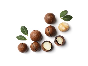 Composition with organic Macadamia nuts on white background, top view