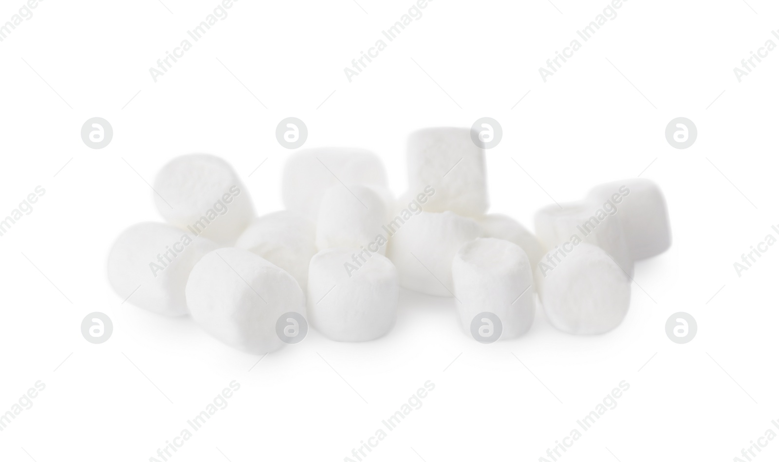 Photo of Delicious sweet puffy marshmallows isolated on white