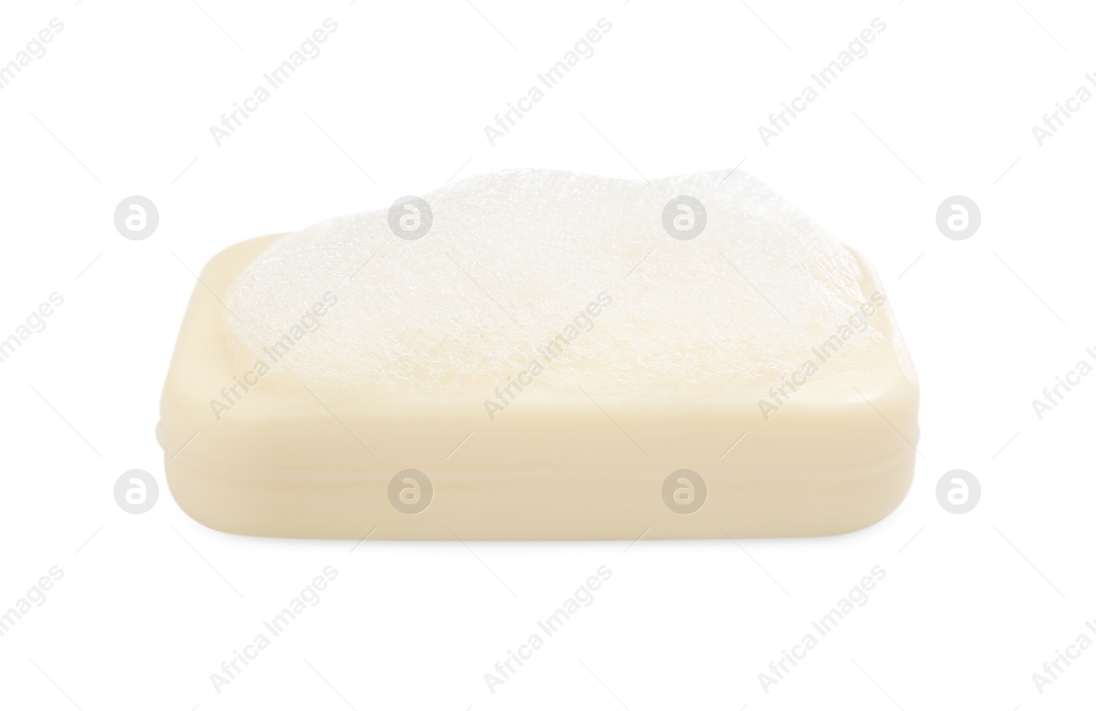 Photo of Soap bar with fluffy foam on white background