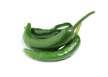 Green hot chili peppers on white background