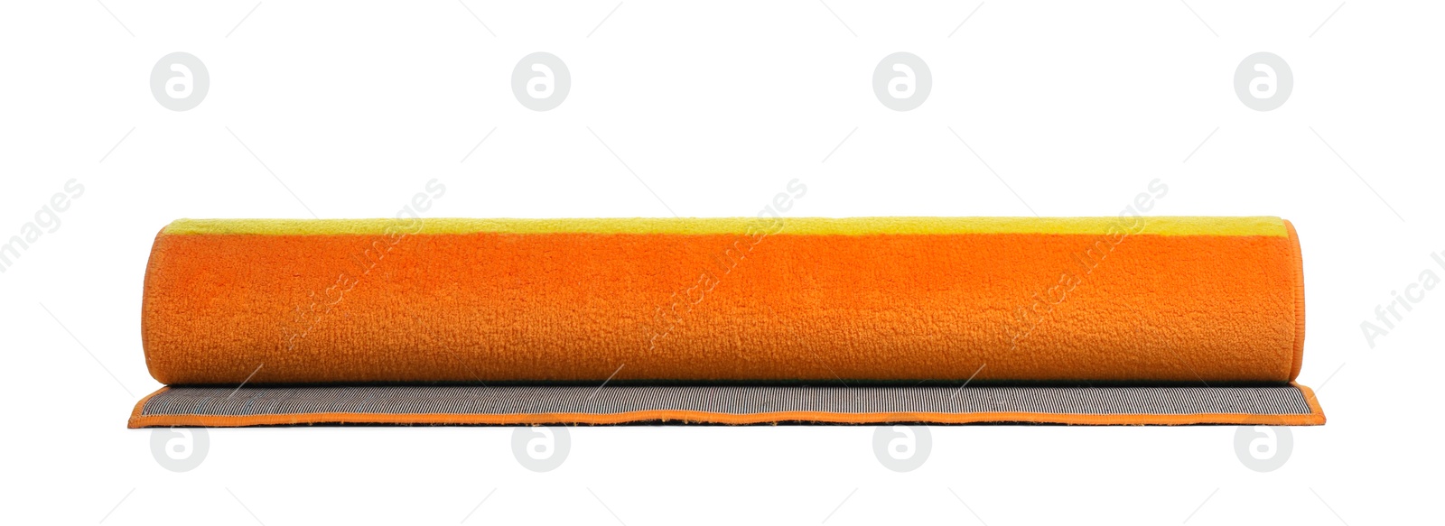 Photo of Rolled colorful carpet on white background. Interior element