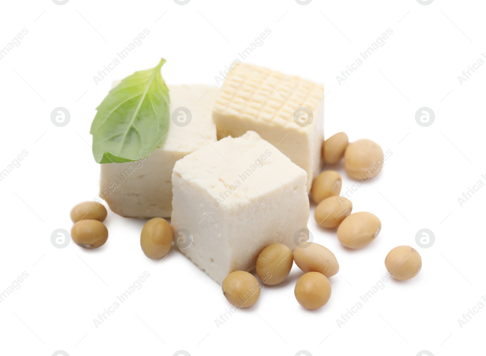 Photo of Delicious tofu cheese, basil and soybeans isolated on white