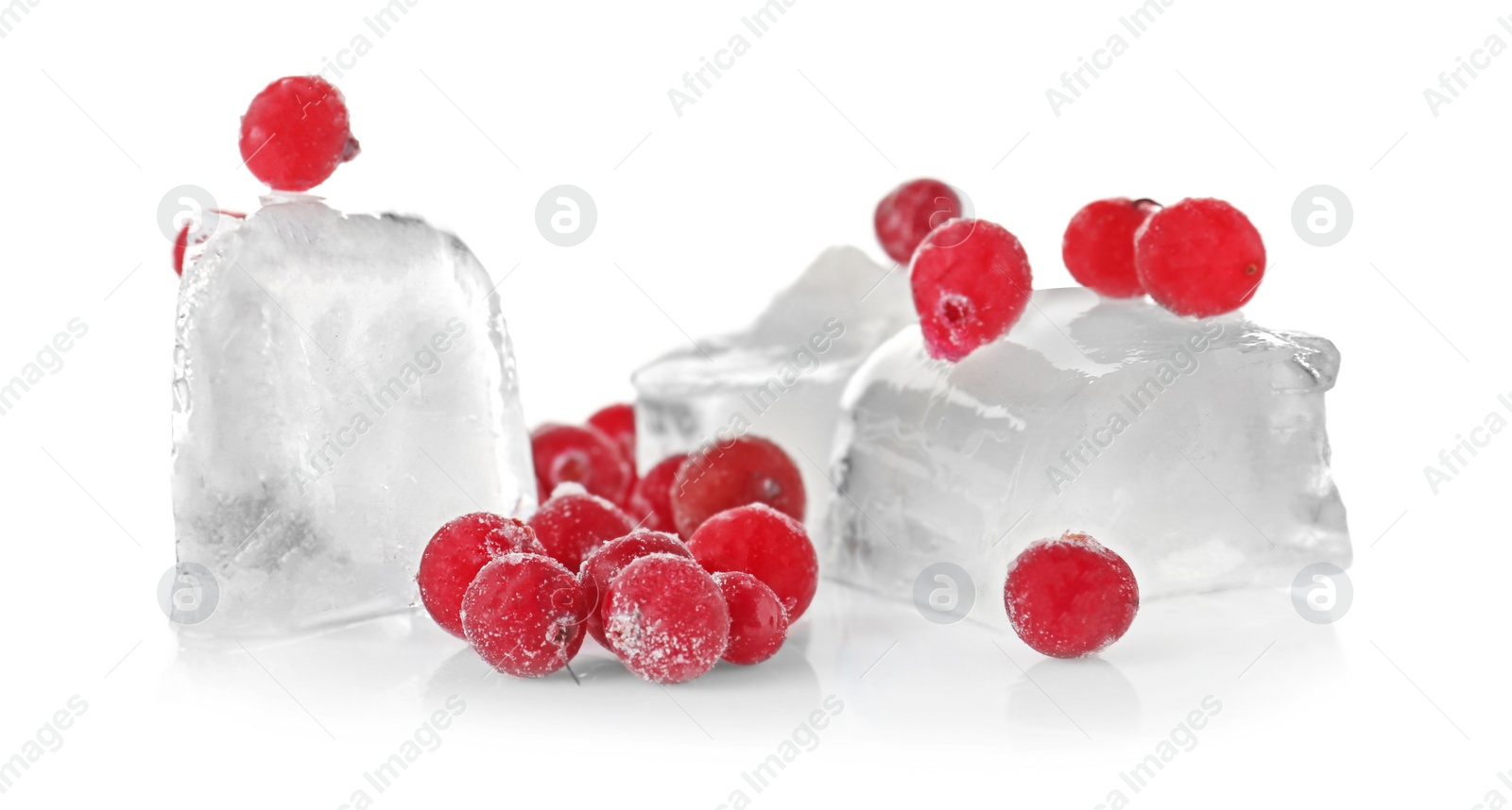 Photo of Frozen berries and ice cubes on white background