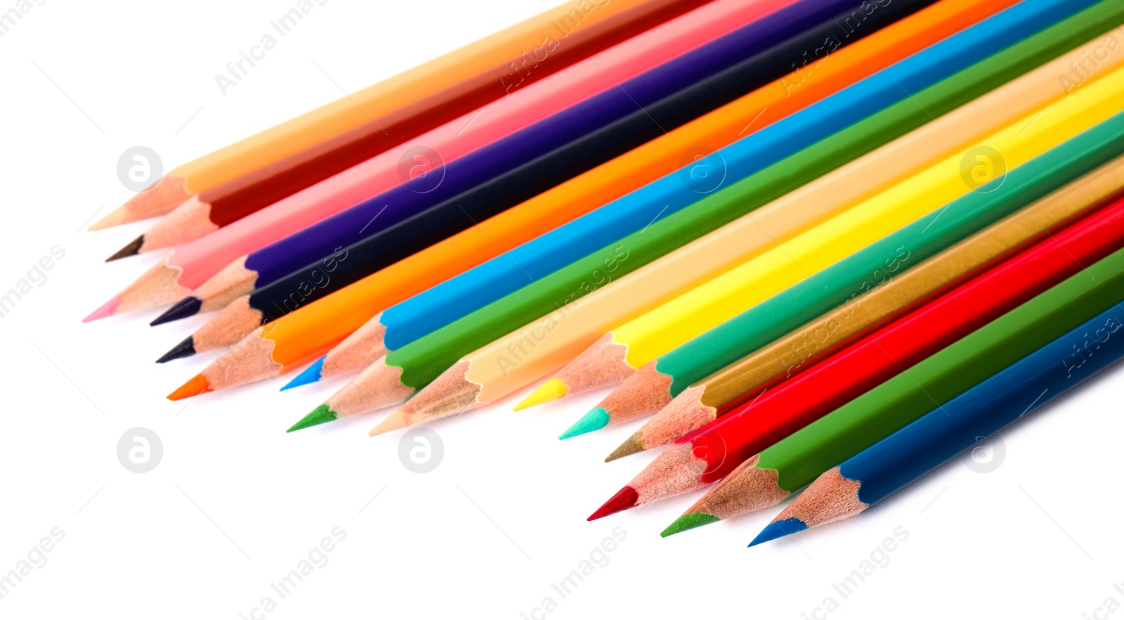 Photo of Different color pencils on white background. School stationery