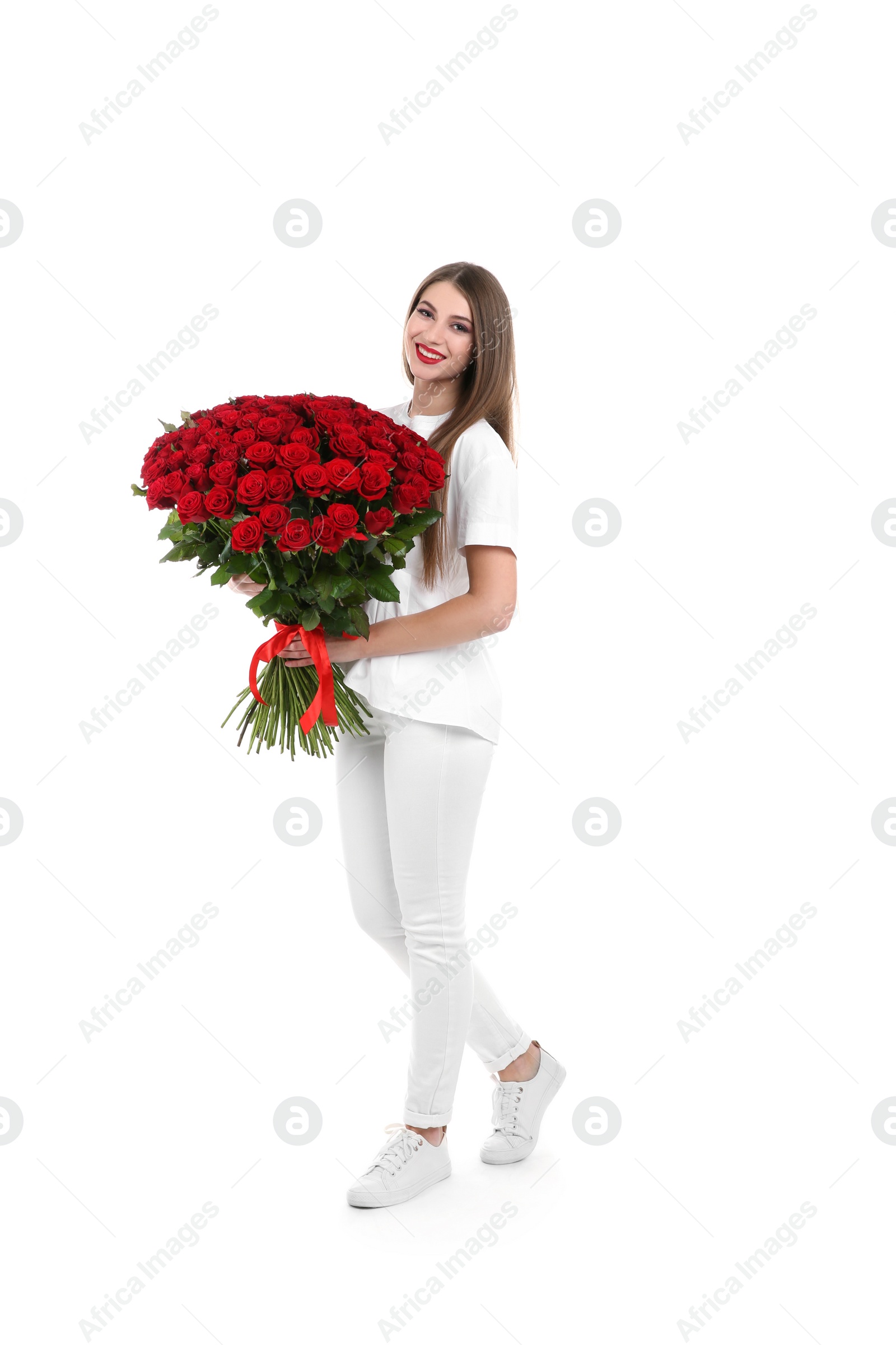 Photo of Full length portrait of beautiful woman with bouquet of roses on white background