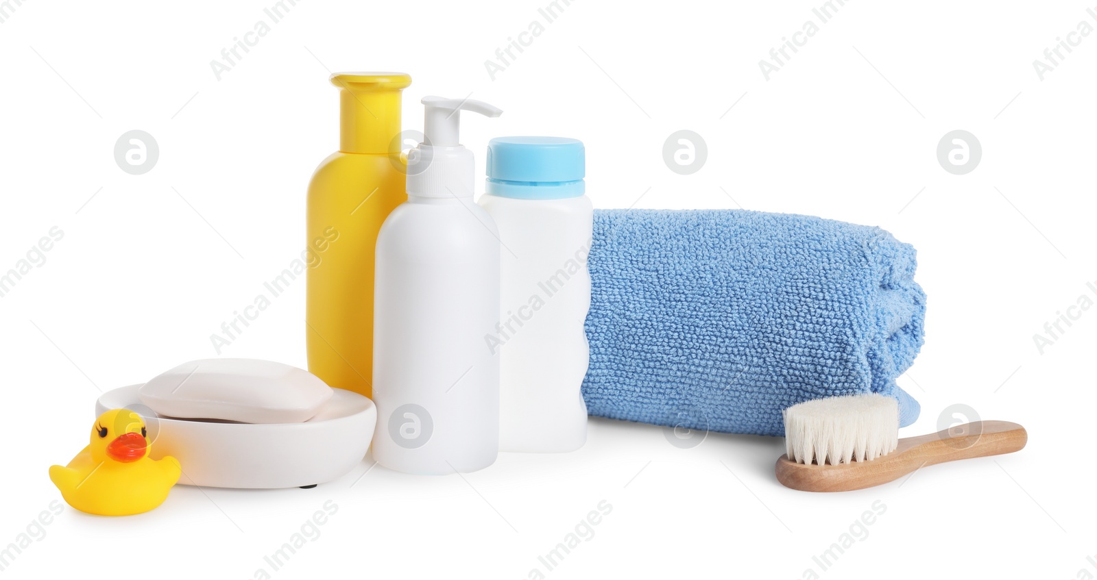 Photo of Baby cosmetic products, bath duck, brush and towel isolated on white