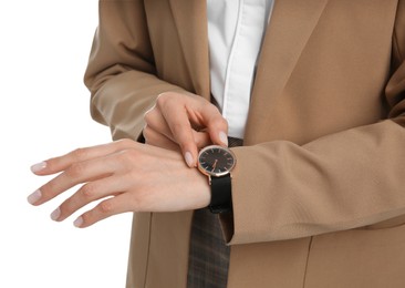 Businesswoman with wristwatch on white background, closeup. Time management