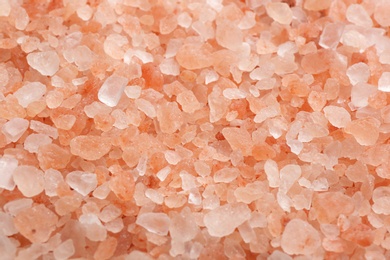 Pink himalayan salt as background, closeup view