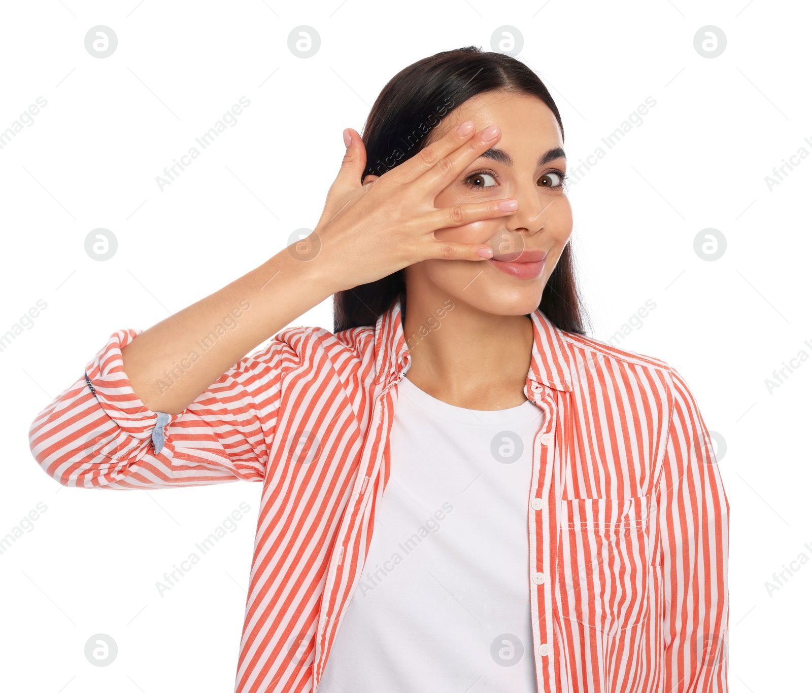 Photo of Embarrassed woman covering face with hand on white background