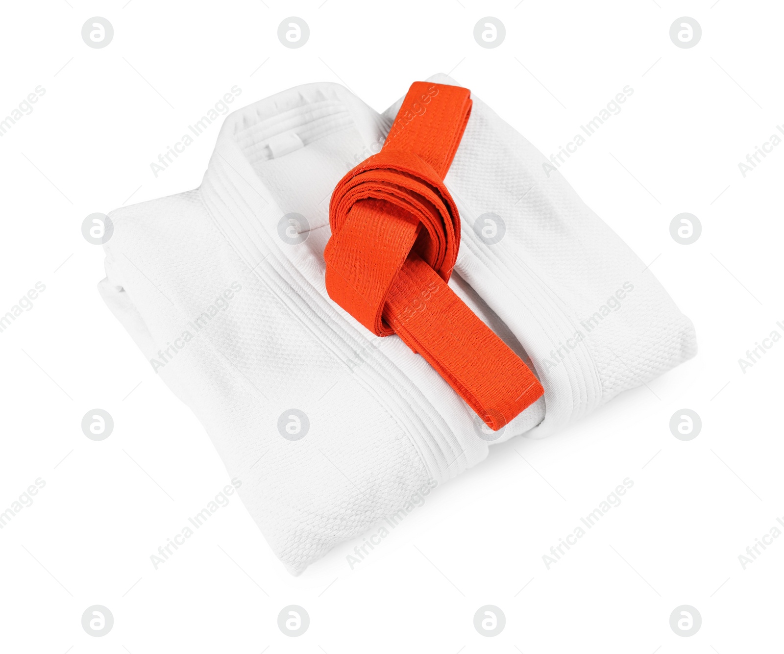 Photo of Orange karate belt and kimono isolated on white