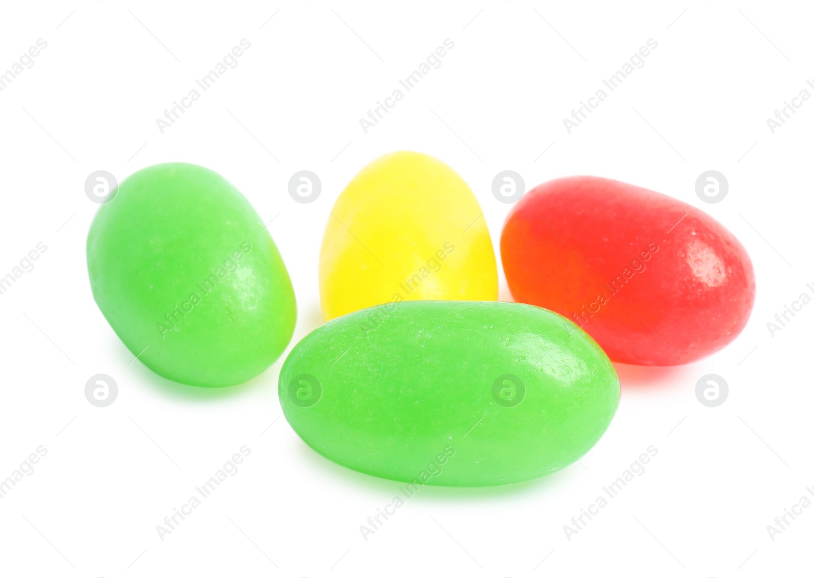 Photo of Delicious colorful jelly beans isolated on white