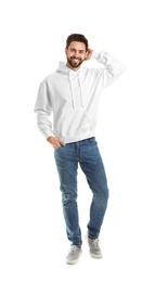 Full length portrait of young man in sweater isolated on white. Mock up for design