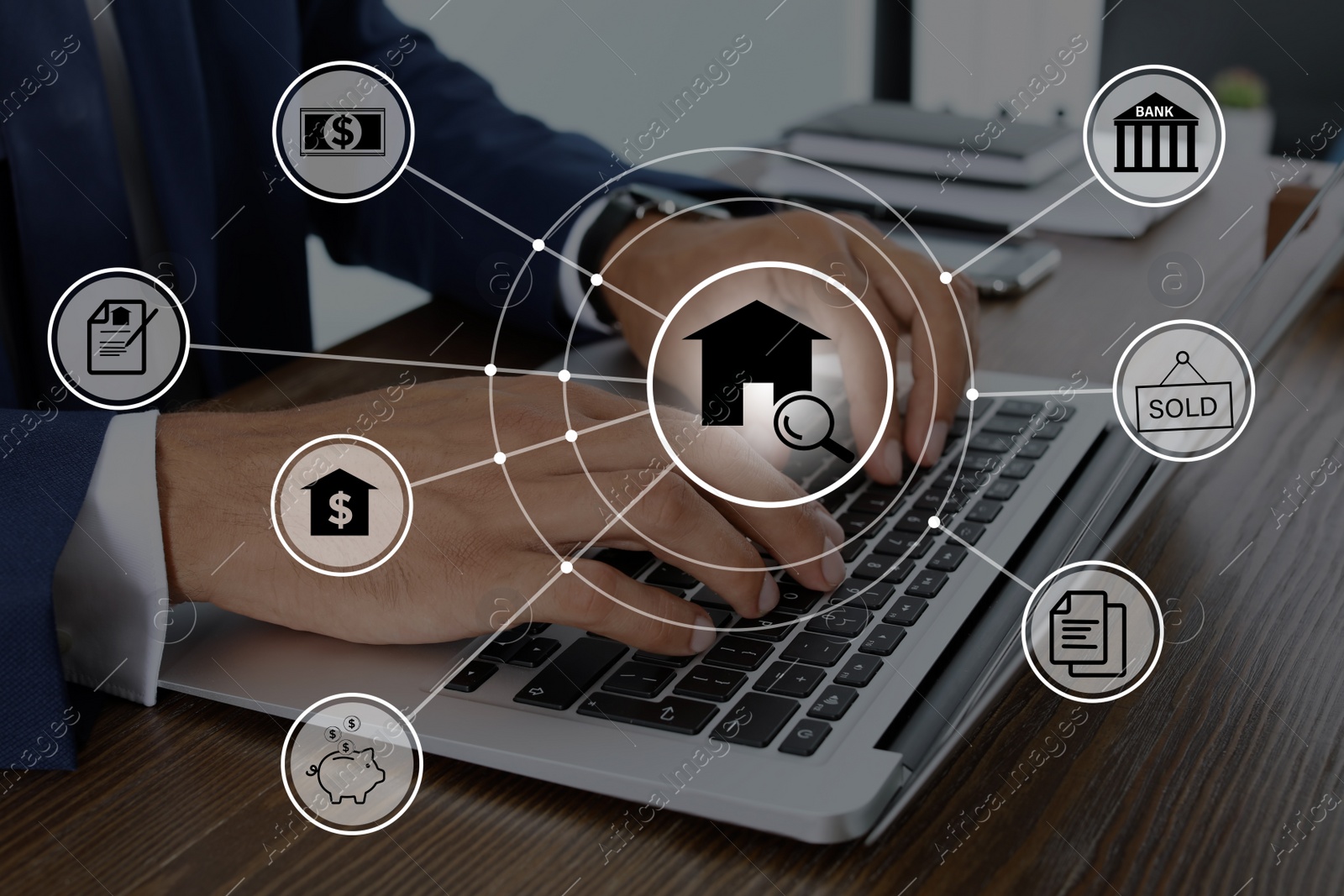 Image of Scheme with real estate icons against agent working on laptop
